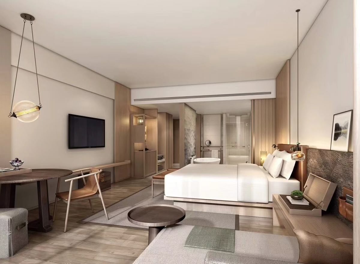 Open-plan studio with kitchenette, dining table, and neutral palette